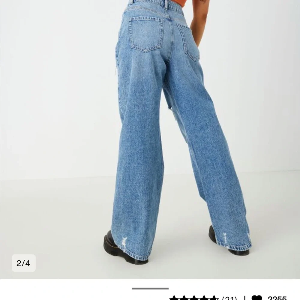Blue distressed jeans - Picture 1 of 2